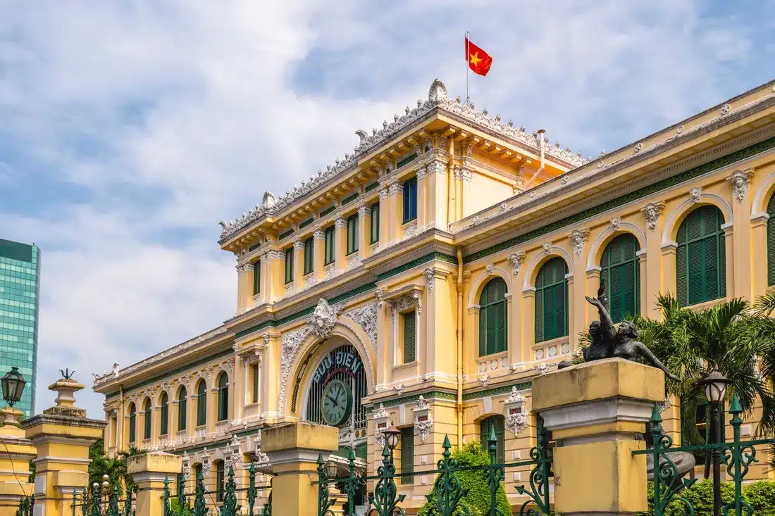 Saigon Central Post Office in District 1 under a blue sky